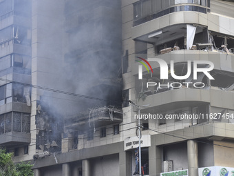 An apartment block lies in partial ruins after being hit by an Israeli airstrike in Beirut, Lebanon, on October 1, 2024. After escalating st...