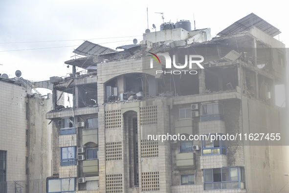 An apartment block lies in partial ruins after being hit by an Israeli airstrike in Beirut, Lebanon, on October 1, 2024. After escalating st...