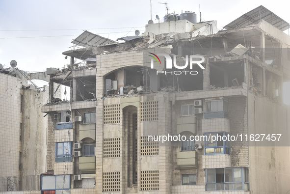 An apartment block lies in partial ruins after being hit by an Israeli airstrike in Beirut, Lebanon, on October 1, 2024. After escalating st...