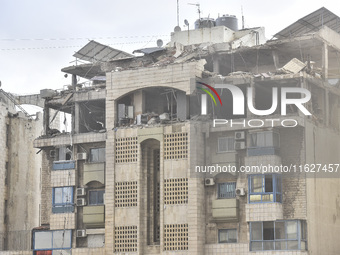 An apartment block lies in partial ruins after being hit by an Israeli airstrike in Beirut, Lebanon, on October 1, 2024. After escalating st...