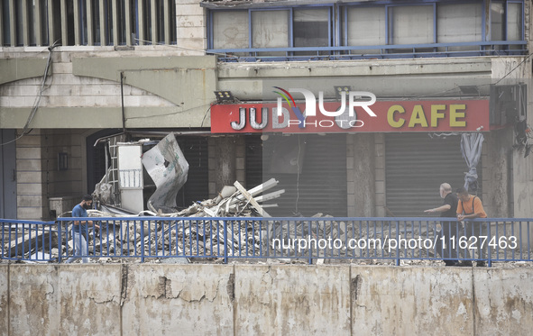 An apartment block lies in partial ruins after being hit by an Israeli airstrike in Beirut, Lebanon, on October 1, 2024. After escalating st...