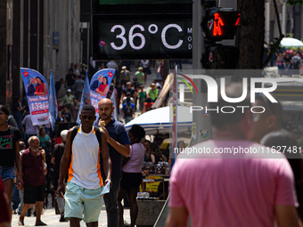 A street thermometer registers 36oC in the central region of Sao Paulo, Brazil, on October 1, 2024. (