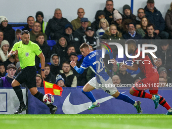 #28, Jay Stansfield of Birmingham races forward chased by #17, Brodie Spencer of Huddersfield during the Sky Bet League 1 match between Birm...