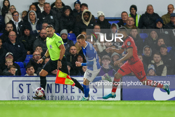 #28, Jay Stansfield of Birmingham races forward chased by #17, Brodie Spencer of Huddersfield during the Sky Bet League 1 match between Birm...