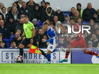 #28, Jay Stansfield of Birmingham races forward chased by #17, Brodie Spencer of Huddersfield during the Sky Bet League 1 match between Birm...