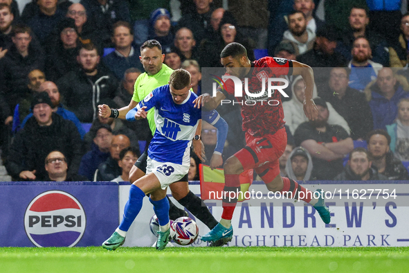 #28, Jay Stansfield of Birmingham battles with #17, Brodie Spencer of Huddersfield during the Sky Bet League 1 match between Birmingham City...