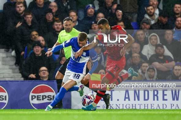 #28, Jay Stansfield of Birmingham battles with #17, Brodie Spencer of Huddersfield during the Sky Bet League 1 match between Birmingham City...