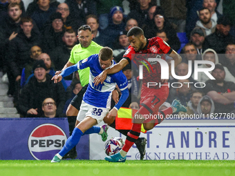 #28, Jay Stansfield of Birmingham battles with #17, Brodie Spencer of Huddersfield during the Sky Bet League 1 match between Birmingham City...