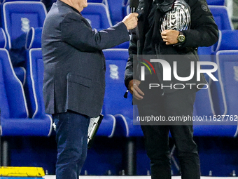 Local celebrity and bare-knuckle champion Connor Tierney (right) is interviewed at the interval during the Sky Bet League 1 match between Bi...