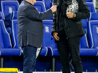 Local celebrity and bare-knuckle champion Connor Tierney (right) is interviewed at the interval during the Sky Bet League 1 match between Bi...