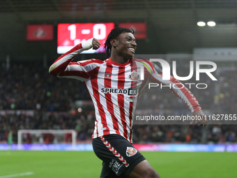 Sunderland's Romaine Mundle celebrates his assist during the Sky Bet Championship match between Sunderland and Derby County at the Stadium O...