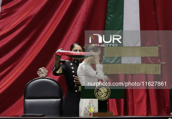 Claudia Sheinbaum (off-white dress), president of Mexico, receives the presidential sash in Mexico City, Mexico, on October 1, 2024, at the...