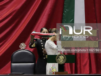 Claudia Sheinbaum (off-white dress), president of Mexico, receives the presidential sash in Mexico City, Mexico, on October 1, 2024, at the...