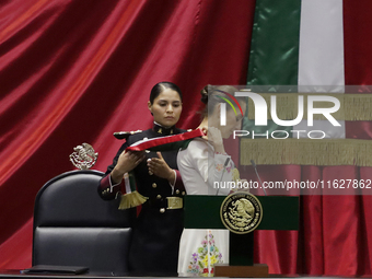 Claudia Sheinbaum (off-white dress), president of Mexico, receives the presidential sash in Mexico City, Mexico, on October 1, 2024, at the...