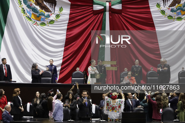 Claudia Sheinbaum (off-white dress), president of Mexico, in Mexico City, Mexico, on October 1, 2024, at the Chamber of Deputies, after rece...