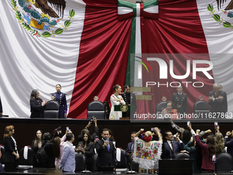 Claudia Sheinbaum (off-white dress), president of Mexico, in Mexico City, Mexico, on October 1, 2024, at the Chamber of Deputies, after rece...