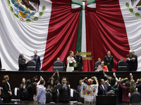 Claudia Sheinbaum (off-white dress), president of Mexico, in Mexico City, Mexico, on October 1, 2024, at the Chamber of Deputies, after rece...