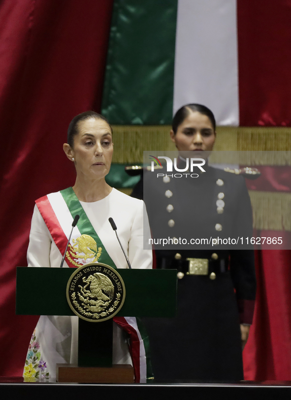 Claudia Sheinbaum (off-white dress), president of Mexico, in Mexico City, Mexico, on October 1, 2024, at the Chamber of Deputies, after rece...