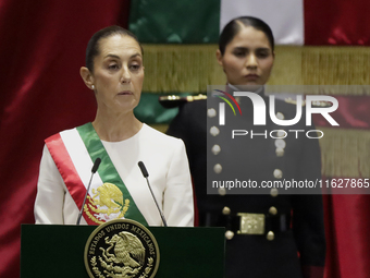 Claudia Sheinbaum (off-white dress), president of Mexico, in Mexico City, Mexico, on October 1, 2024, at the Chamber of Deputies, after rece...