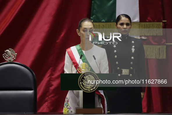 Claudia Sheinbaum (off-white dress), president of Mexico, in Mexico City, Mexico, on October 1, 2024, at the Chamber of Deputies, after rece...