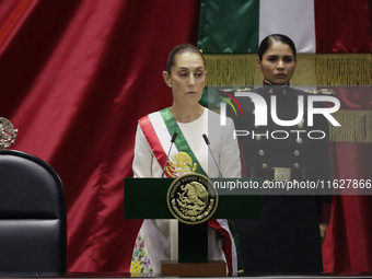 Claudia Sheinbaum (off-white dress), president of Mexico, in Mexico City, Mexico, on October 1, 2024, at the Chamber of Deputies, after rece...