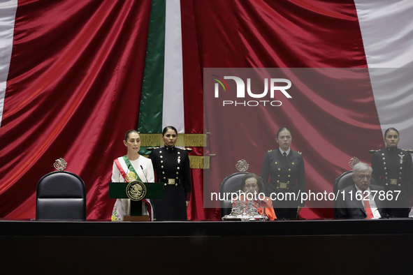 Claudia Sheinbaum (off-white dress), president of Mexico, in Mexico City, Mexico, on October 1, 2024, at the Chamber of Deputies, after rece...