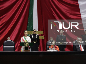 Claudia Sheinbaum (off-white dress), president of Mexico, in Mexico City, Mexico, on October 1, 2024, at the Chamber of Deputies, after rece...