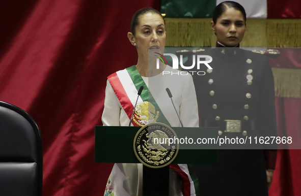 Claudia Sheinbaum (off-white dress), president of Mexico, in Mexico City, Mexico, on October 1, 2024, at the Chamber of Deputies, after rece...