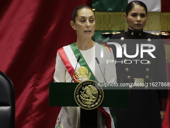 Claudia Sheinbaum (off-white dress), president of Mexico, in Mexico City, Mexico, on October 1, 2024, at the Chamber of Deputies, after rece...