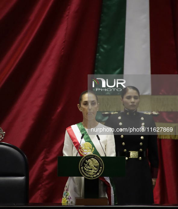 Claudia Sheinbaum (off-white dress), president of Mexico, in Mexico City, Mexico, on October 1, 2024, at the Chamber of Deputies, after rece...