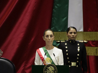 Claudia Sheinbaum (off-white dress), president of Mexico, in Mexico City, Mexico, on October 1, 2024, at the Chamber of Deputies, after rece...