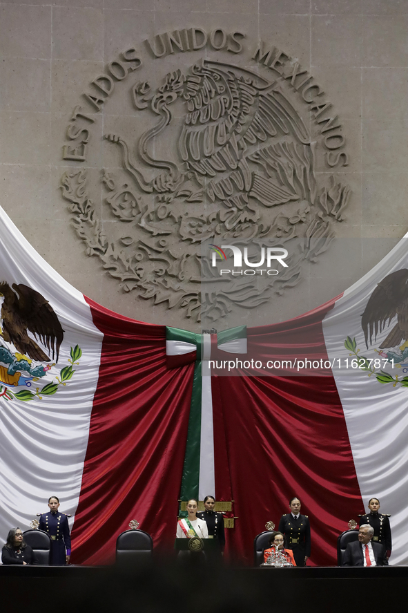 Claudia Sheinbaum (off-white dress), president of Mexico, in Mexico City, Mexico, on October 1, 2024, at the Chamber of Deputies, after rece...