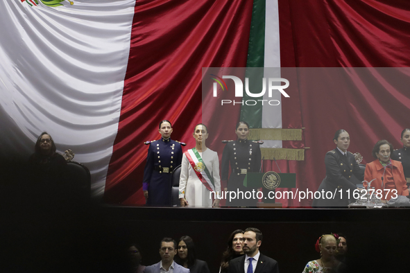 Claudia Sheinbaum (off-white dress), president of Mexico, in Mexico City, Mexico, on October 1, 2024, at the Chamber of Deputies, after rece...