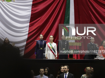 Claudia Sheinbaum (off-white dress), president of Mexico, in Mexico City, Mexico, on October 1, 2024, at the Chamber of Deputies, after rece...