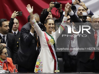 Claudia Sheinbaum (off-white dress), president of Mexico, in Mexico City, Mexico, on October 1, 2024, at the Chamber of Deputies, after rece...