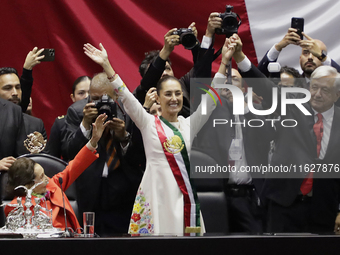 Claudia Sheinbaum (off-white dress), president of Mexico, in Mexico City, Mexico, on October 1, 2024, at the Chamber of Deputies, after rece...