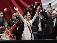 Claudia Sheinbaum (off-white dress), president of Mexico, in Mexico City, Mexico, on October 1, 2024, at the Chamber of Deputies, after rece...