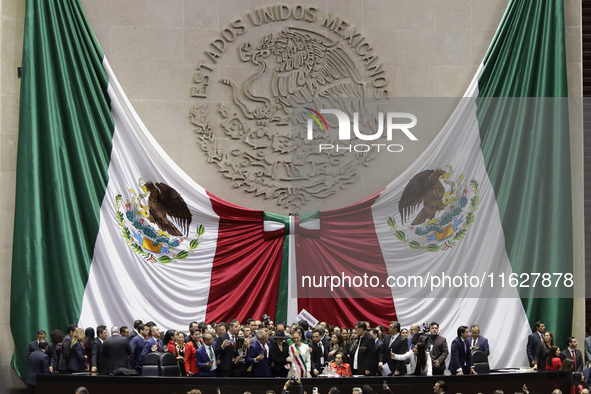 Claudia Sheinbaum (off-white dress), president of Mexico, in Mexico City, Mexico, on October 1, 2024, at the Chamber of Deputies, after rece...