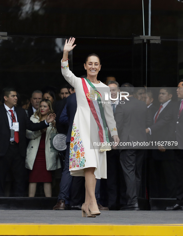 Claudia Sheinbaum, president of Mexico, greets supporters in Mexico City, Mexico, on October 1, 2024, at the Chamber of Deputies after recei...