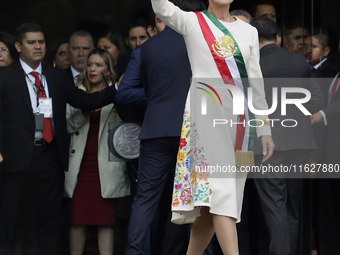 Claudia Sheinbaum, president of Mexico, greets supporters in Mexico City, Mexico, on October 1, 2024, at the Chamber of Deputies after recei...