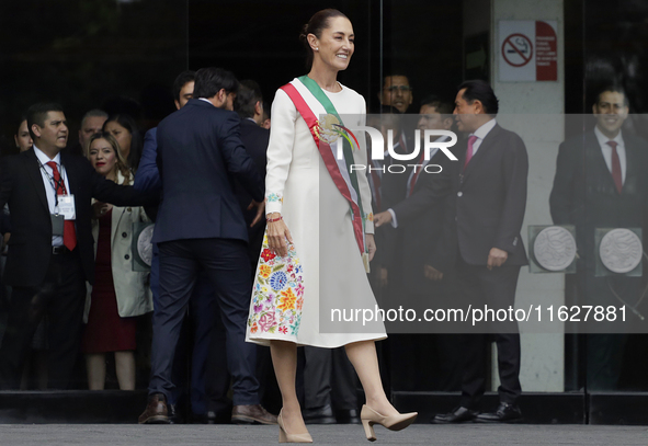 Claudia Sheinbaum, president of Mexico, greets supporters in Mexico City, Mexico, on October 1, 2024, at the Chamber of Deputies after recei...