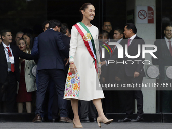 Claudia Sheinbaum, president of Mexico, greets supporters in Mexico City, Mexico, on October 1, 2024, at the Chamber of Deputies after recei...