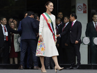 Claudia Sheinbaum, president of Mexico, greets supporters in Mexico City, Mexico, on October 1, 2024, at the Chamber of Deputies after recei...