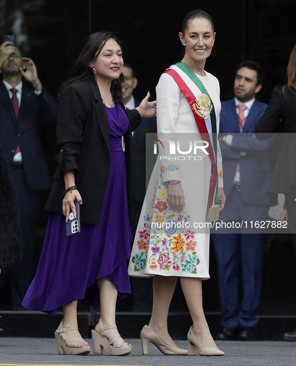 Claudia Sheinbaum, president of Mexico, greets supporters in Mexico City, Mexico, on October 1, 2024, at the Chamber of Deputies after recei...