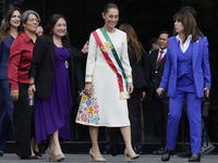 Claudia Sheinbaum, president of Mexico, greets supporters in Mexico City, Mexico, on October 1, 2024, at the Chamber of Deputies after recei...