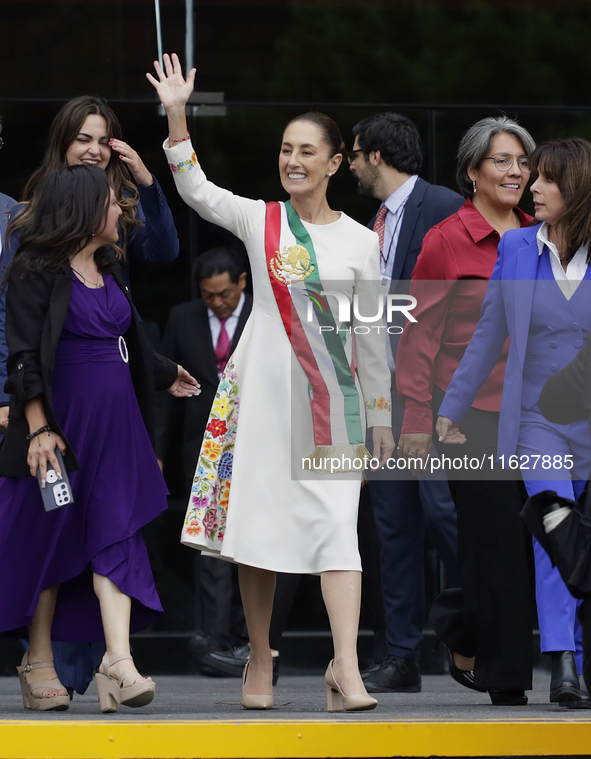 Claudia Sheinbaum, president of Mexico, greets supporters in Mexico City, Mexico, on October 1, 2024, at the Chamber of Deputies after recei...