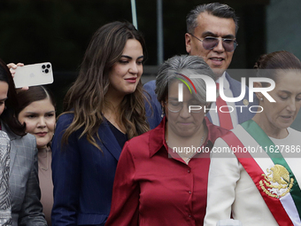 Claudia Sheinbaum, president of Mexico, greets supporters in Mexico City, Mexico, on October 1, 2024, at the Chamber of Deputies after recei...