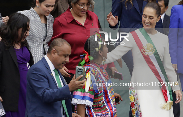 Claudia Sheinbaum, president of Mexico, greets supporters in Mexico City, Mexico, on October 1, 2024, at the Chamber of Deputies after recei...