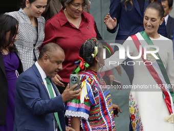 Claudia Sheinbaum, president of Mexico, greets supporters in Mexico City, Mexico, on October 1, 2024, at the Chamber of Deputies after recei...