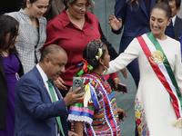 Claudia Sheinbaum, president of Mexico, greets supporters in Mexico City, Mexico, on October 1, 2024, at the Chamber of Deputies after recei...